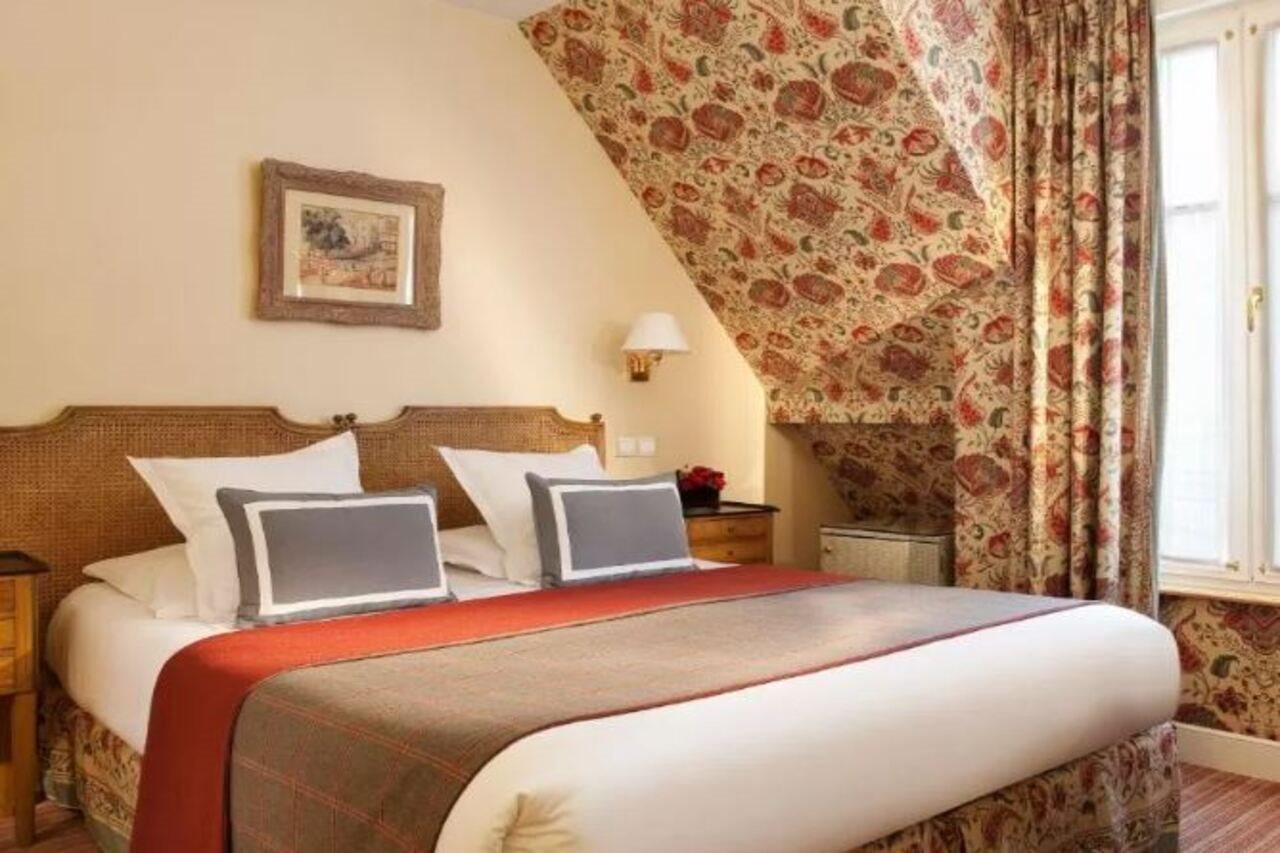 โฮเทล เรอแล มาเดอเลน Hotel ปารีส ภายนอก รูปภาพ